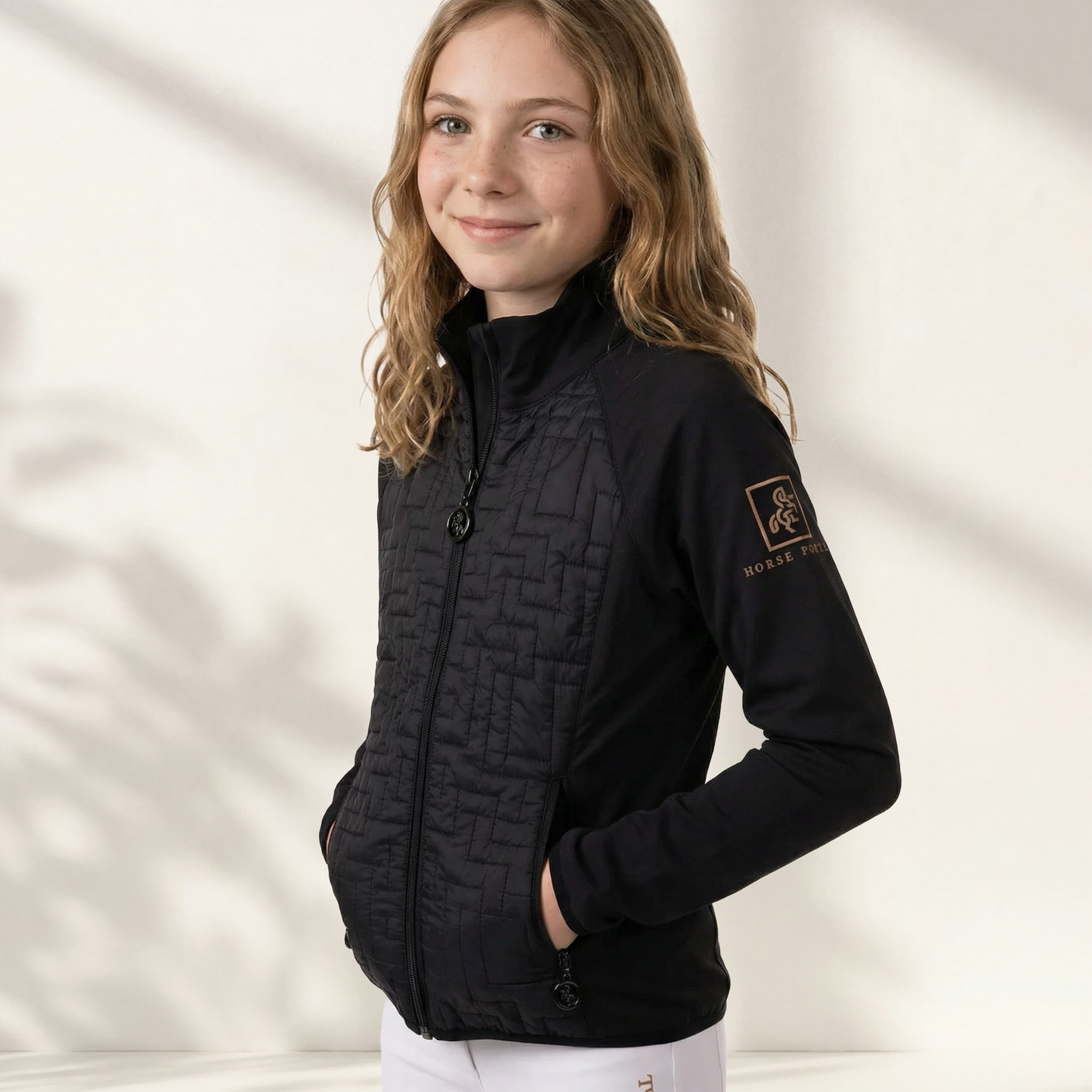 Girls' jacket with front quilting